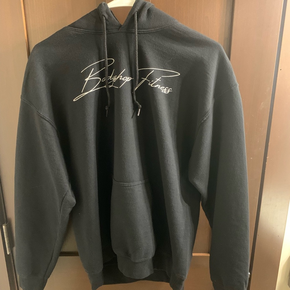 Black BodyShop Fitness hoodie. Worn only a handful of time. Very warm and soft.